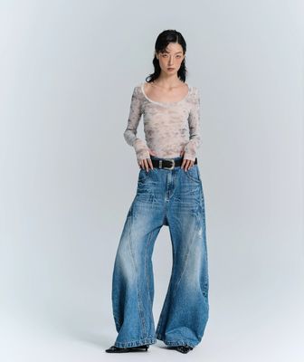 Jeans de pantalones de denim de tejido deconstruido para hombres y mujeres en ropa callejera de talla grande