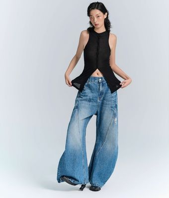 Jeans de pantalones de denim de tejido deconstruido para hombres y mujeres en ropa callejera de talla grande