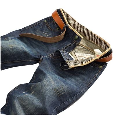 Pantalones regulares con cremallera de mosca XMAMLON de estiramiento de moda jeans de cintura media delgada para hombres
