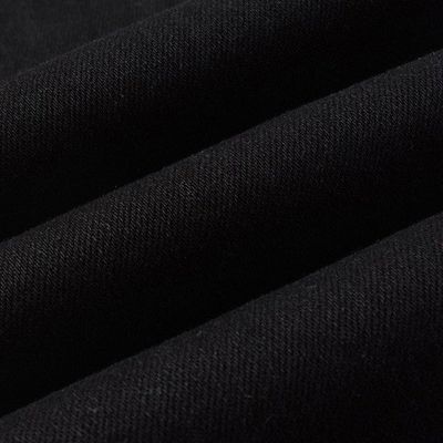 Cinturón de doble capa de diseño plegado negro de estreno apilado jeans de denim delgado para hombres